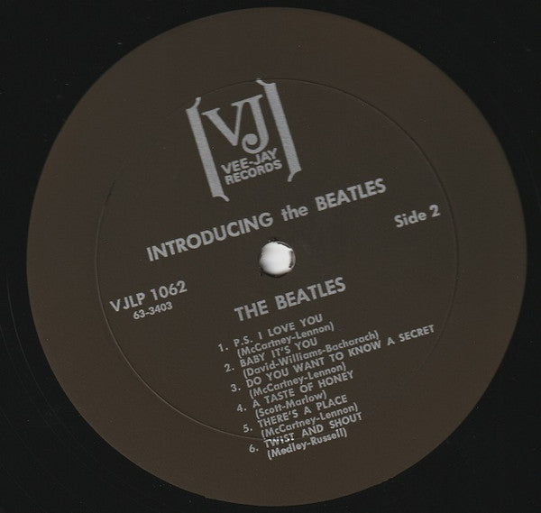 The Beatles – Introducing The Beatles - Vinyl LP, Album, Unofficial Release, Stereo, Mono, Black and Silver Label, US (USED VG)
